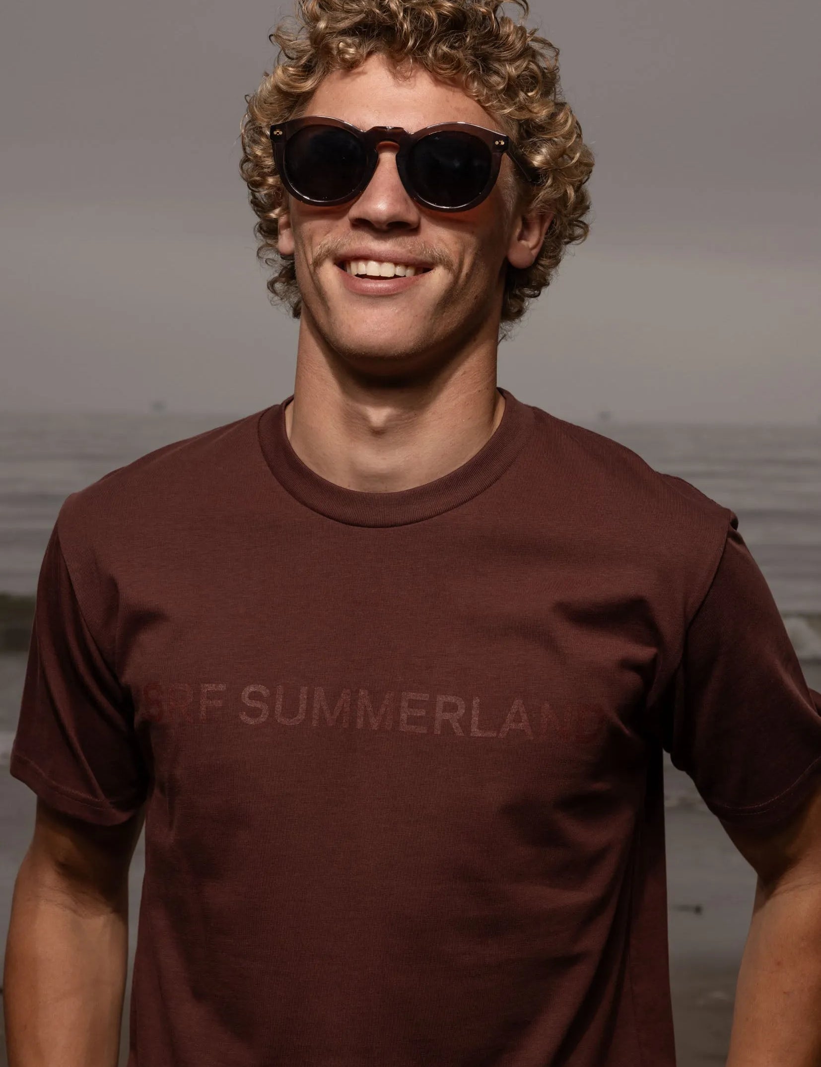 SRF SUMMERLAND Unisex Tee - Chocolate - Heidi Merrick