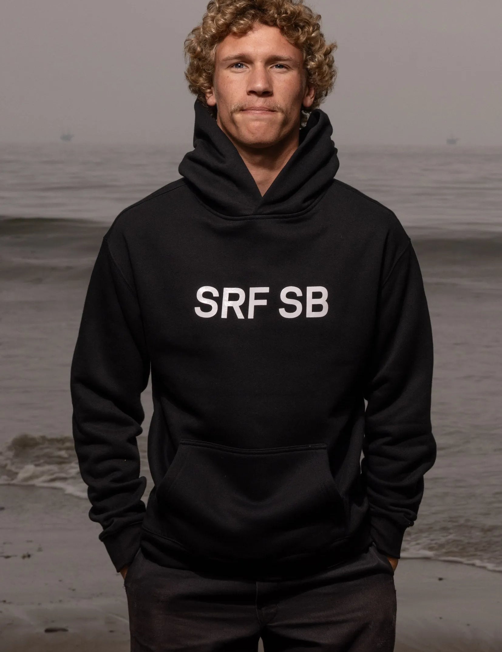 SRF SB Unisex Hoodie - Cream on Black - Heidi Merrick