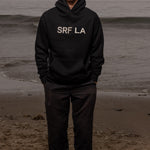 SRF LA Unisex Hoodie - Cream on Black - Heidi Merrick