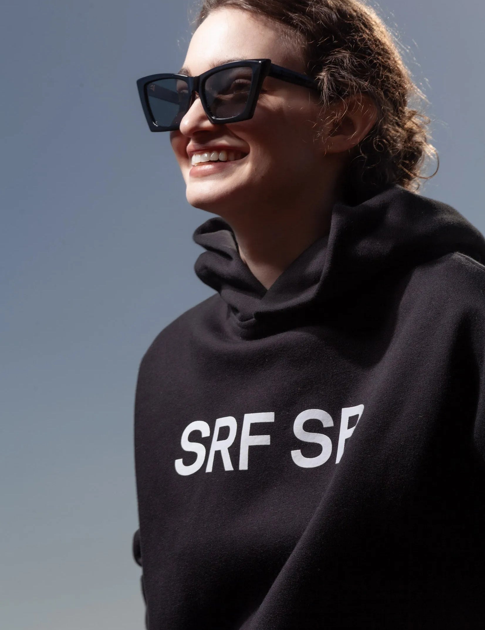 SRF SB Unisex Hoodie - Cream on Black - Heidi Merrick
