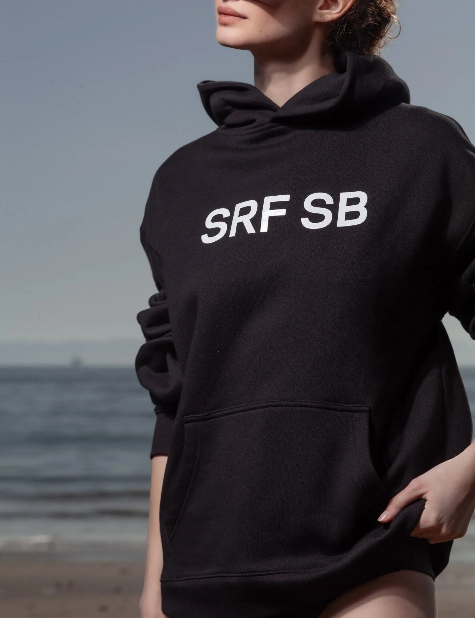 SRF SB Unisex Hoodie - Cream on Black - Heidi Merrick